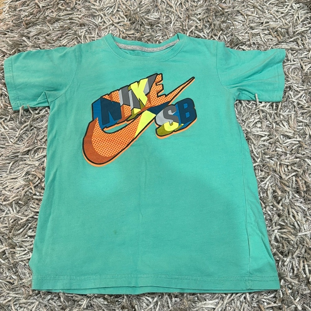 Children’s Nike blue short sleeve tee. Kids small.‎